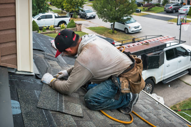 Professional Storm Damage Roof Repair technician working in Hudson, OH